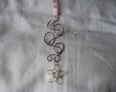 Ornament or suncatcher light pink, lilac swirls