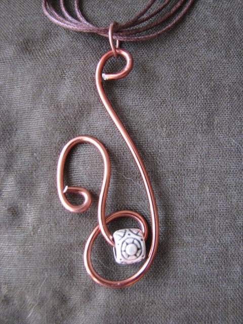 Brown wire pendant.