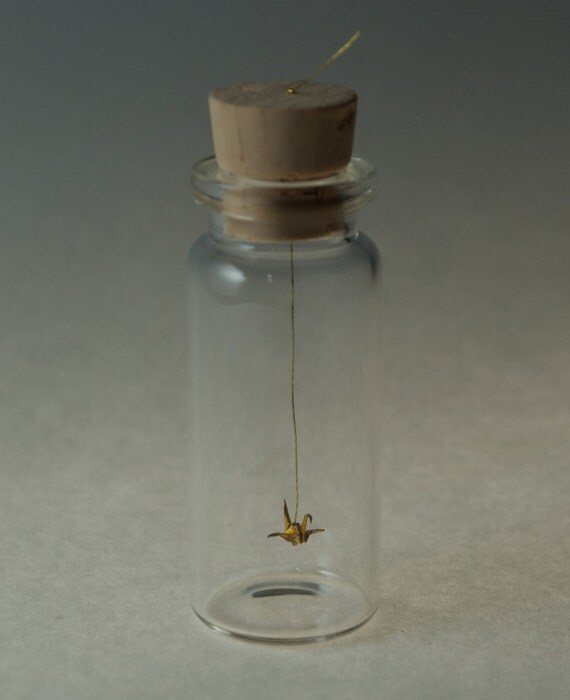 tiny origami golden crane