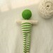 Green striped doll - bonhomme
