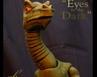 Handmade wooden dino marionette puppet by Geahk Burchill of gb Designs