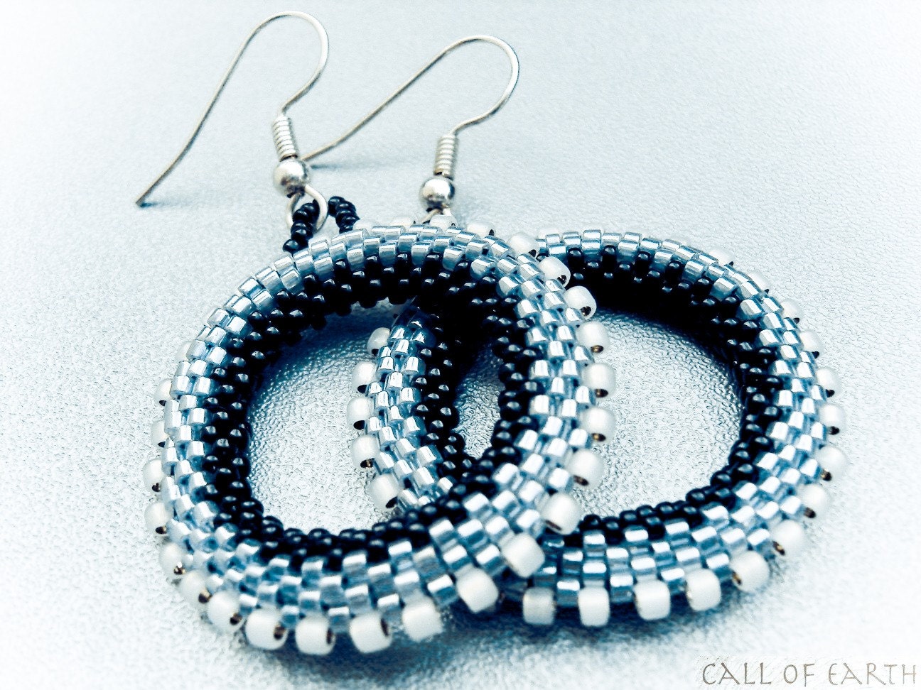 Morning mist. Beadwork hoop earrings. Bead woven black silver grey wheel. steampunk inspired