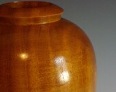 Woodturned hollow vessel made of Lead tree