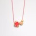 Geometric wooden bead necklace .  Neon pink handpainted
