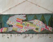 Daisy leaps over the seaglass - Hare - repurposed, wall hanging
