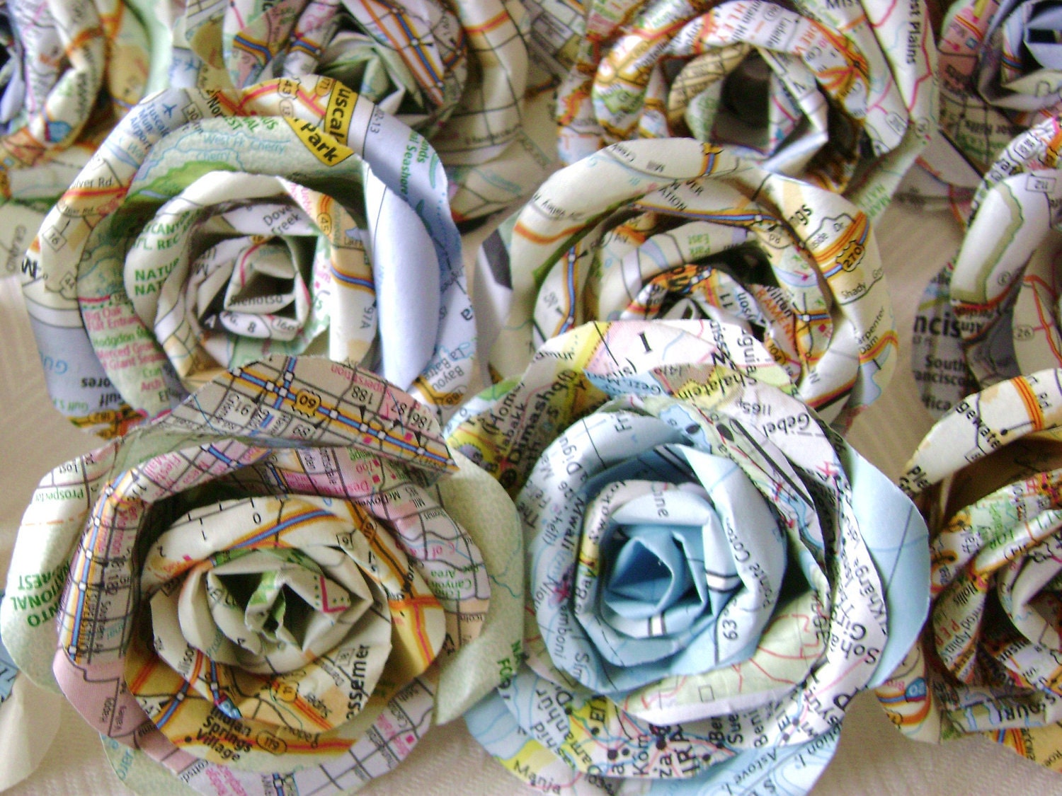 vintage atlas map paper flowers set, bulk lot of 25, wedding decorations, DIY craft supplies, cottage farmhouse decor