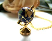 the world on a string necklace.