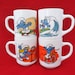 vintage smurfs mugs cups set sport theme peyo arcopal france smurfette skateboard surfing biker tennis kids cartoon