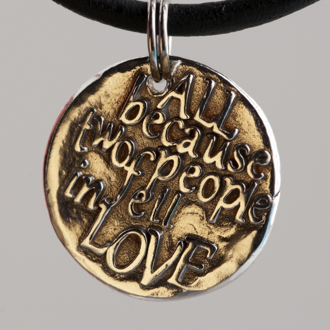 All because two people fell in love... (029) Inspirational quote Silver pendant