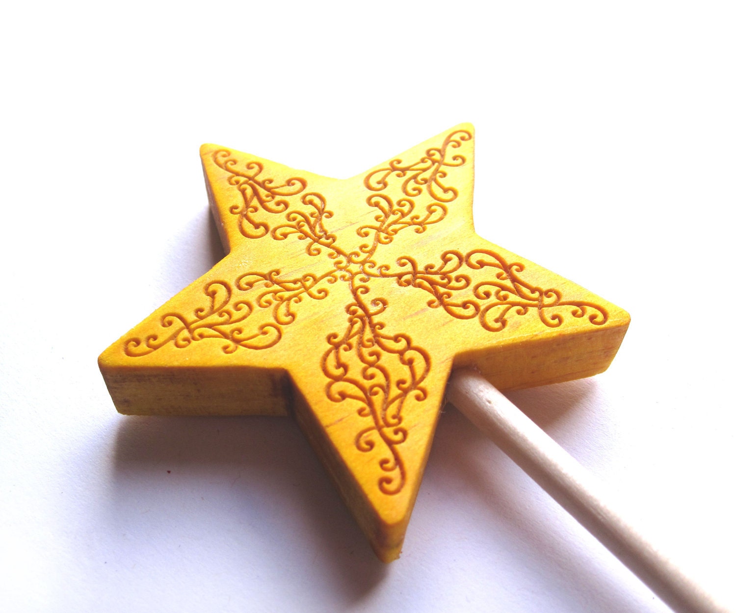 Yellow wand wood swirl design magic