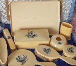 Celluloid Dresser Set 9 pieces marked Parisian Loonen Ivory