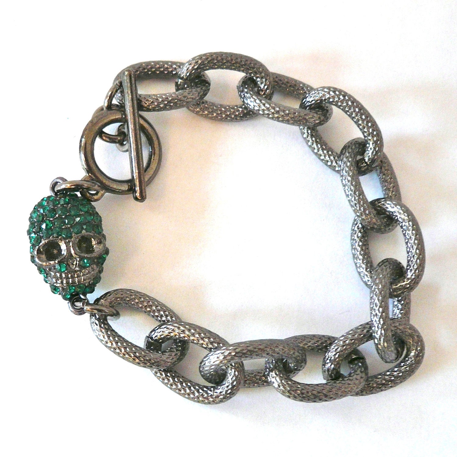 Gunmetal Textured Chain Link Bracelet with Green Pave Skull