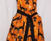 flirty Halloween cat apron with chiffon ruffle and cellphone pocket