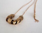 Ceri - geometric brass rings on vintage brass chain long necklace