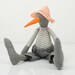 Bird Doll - gray  duck  Wearing White & gray stripes Shirt , jeans  pants  And a white hat with orange dots - handmade