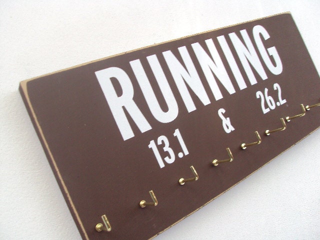 medals holder: running 13.1 and  26.2