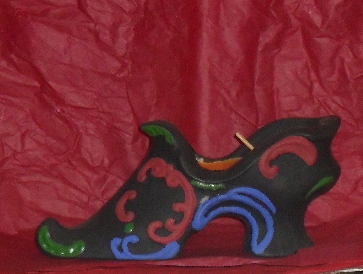 Miniature ceramic shoe and candle. Cinnamon Spice scented candle. Holiday fun theme.