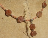 Peach T: Natural stone with peach seed bead necklace.