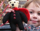 Ladybug Bear with red-spotted wings and antenna.