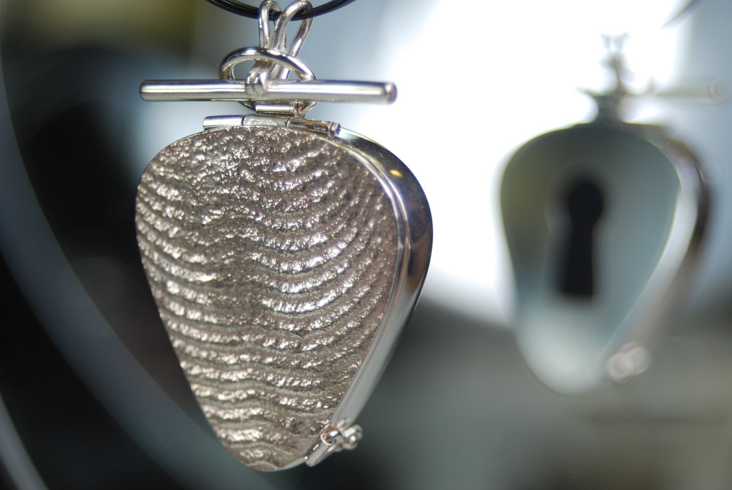 Pick Me- locket- sterling silver guitar pick locket- one of a kind cuttlefish bone casting