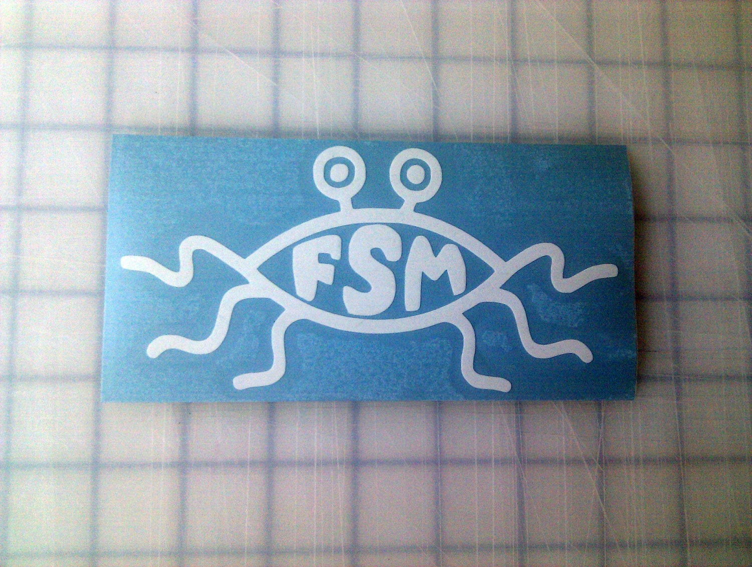 FSM White vinyl decal (Flying Spaghetti Monster - jesus fish parody) 3"x6"