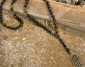 p r o t e c t i o n - hamsa ebony rosary