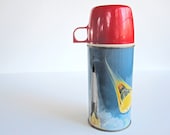 Vintage thermos, "Orbit," John Glenn, Atlas rocket and Mercury spacecraft, 1963 King-Seely Thermos Co. Bottle No. 2056 - modernpoetry