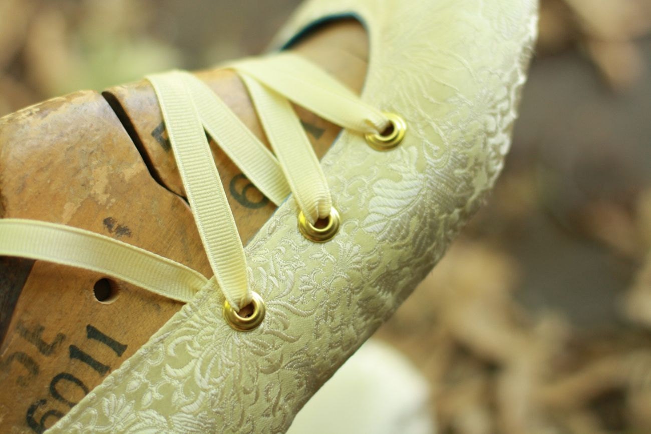Upturned Toe Criss Cross Six-Eyelet Silk Slippers, with Suede Soles