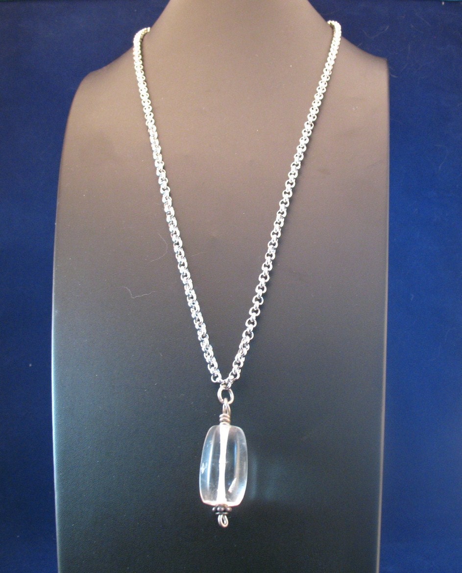 Quartz crystal hand cut pendant with silver chain