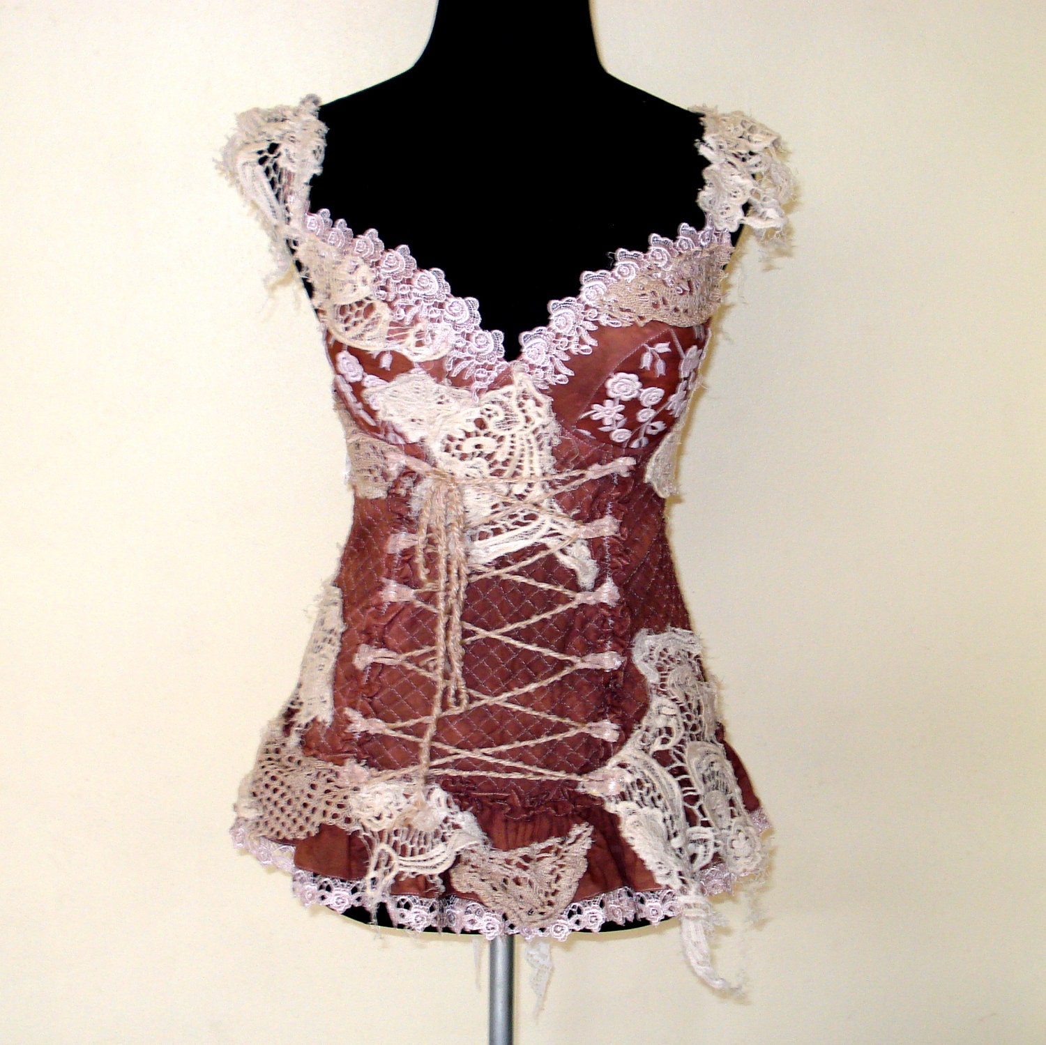 vintage inspired bustier top with shabby crochet and laced front detail..........