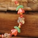 Swarovski crystal & czech glass beaded bracelet, flowers and butterflies, orange, spring fashion