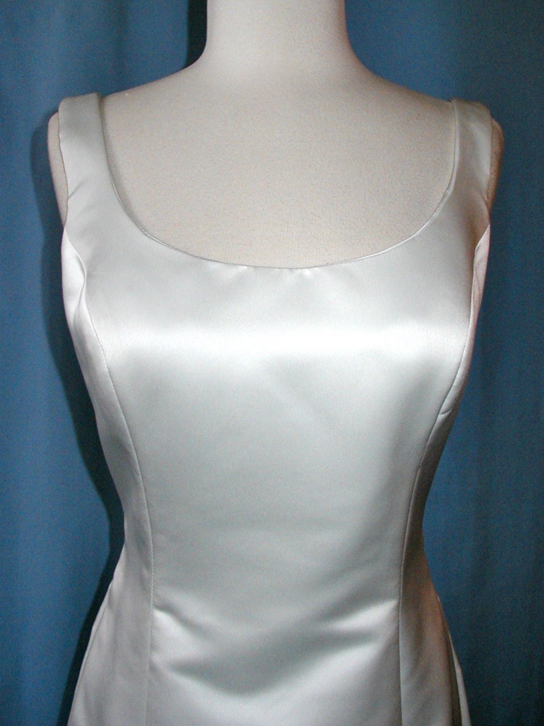 A fabulous sheath styled wedding dress by Carmela Sutera