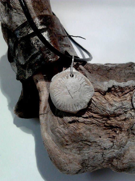 White horn coral fossil and leather necklace
