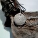 White horn coral fossil and leather necklace