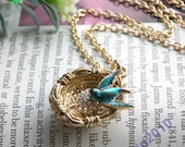 Pretty retro gold Bird Nest roost with one egg pendant necklace vintage style