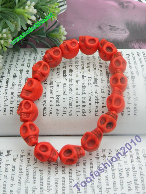 Pretty orange color turquoise skull head with elastic rope bracelet vintage style