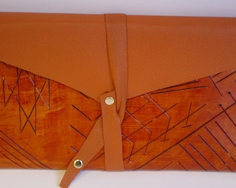 carved leather envelope clutch