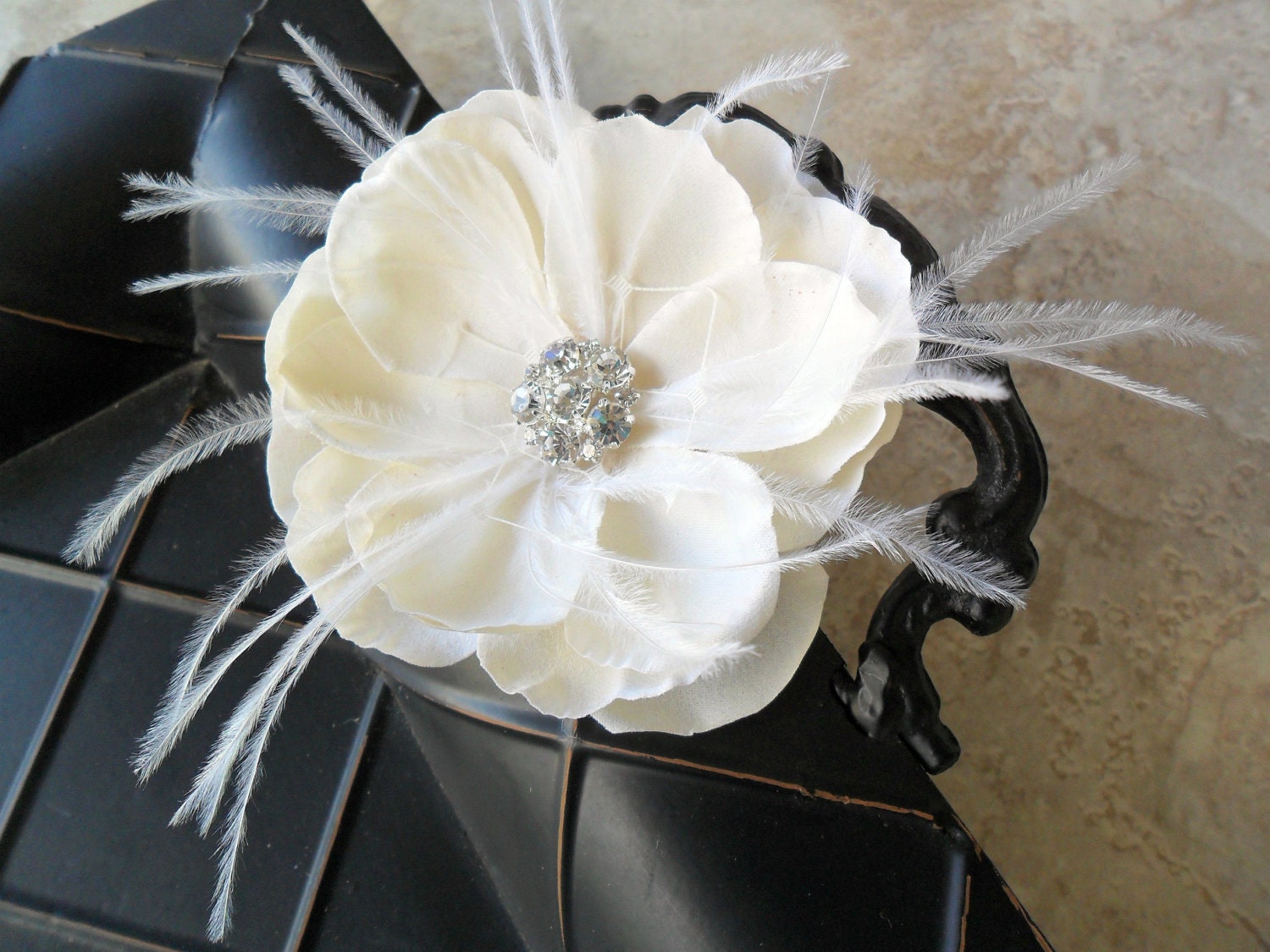 Caroline - beautiful ivory feathered fascinator with rhinestone centerpiece