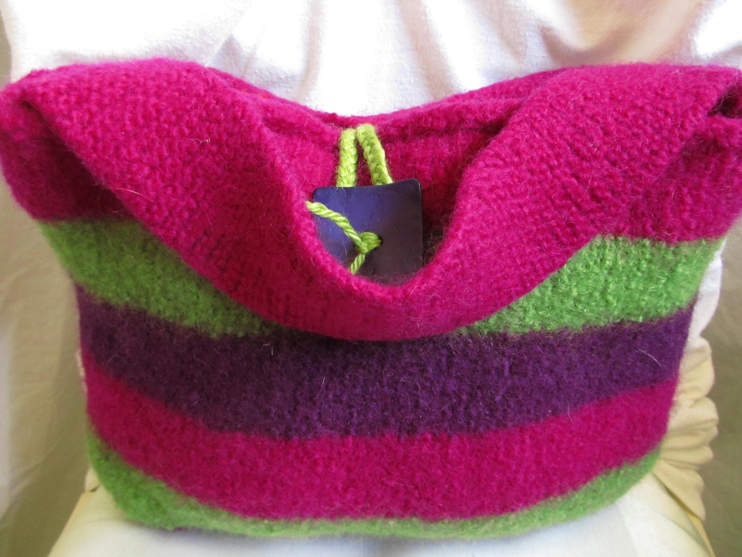 Felted Bag: Pansies in the Garden. Fuschia, purple and grass green stripe this medium felted gypsy bag.