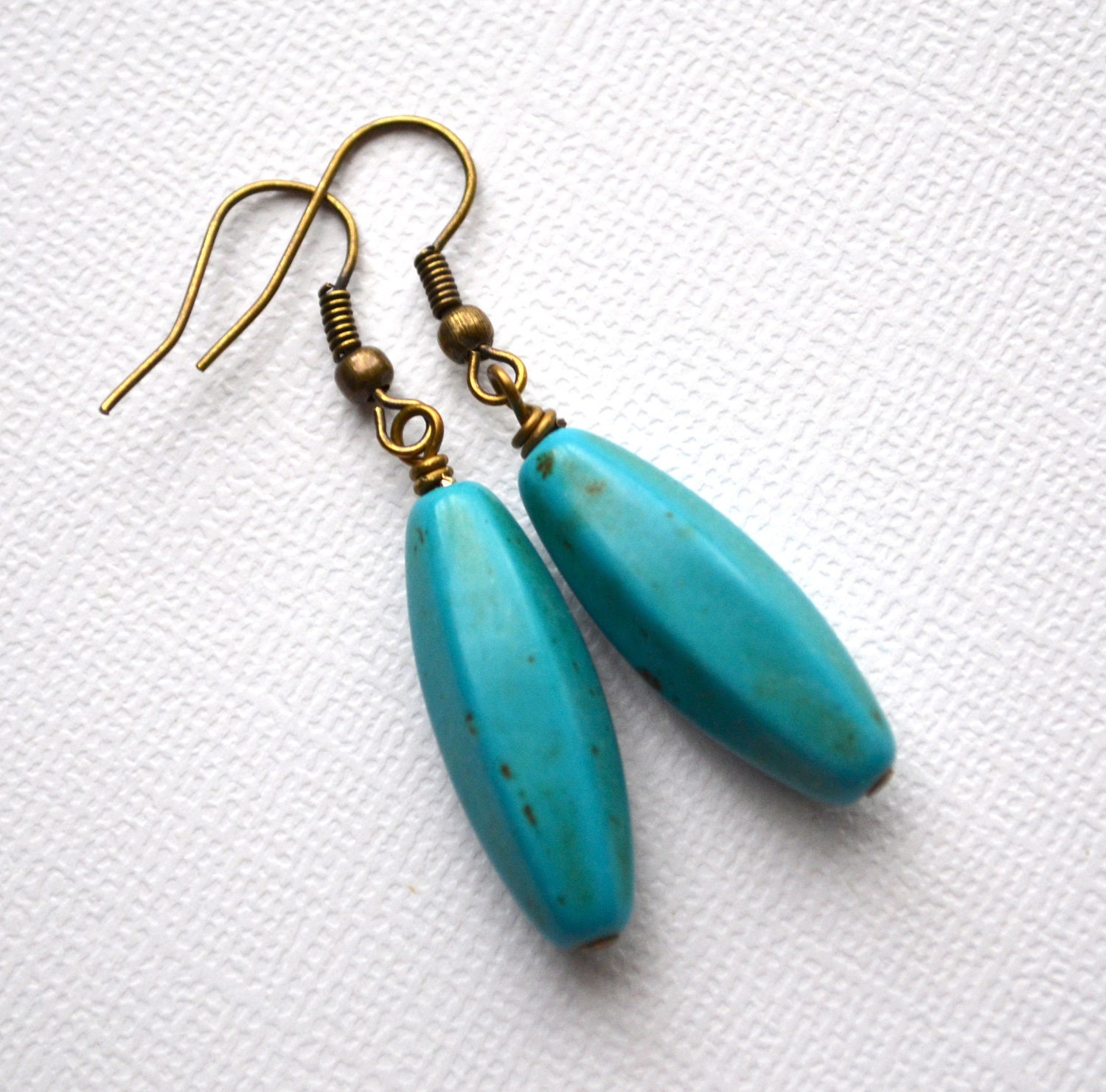 Magnesite Gemstone Faceted Ovals . Earrings