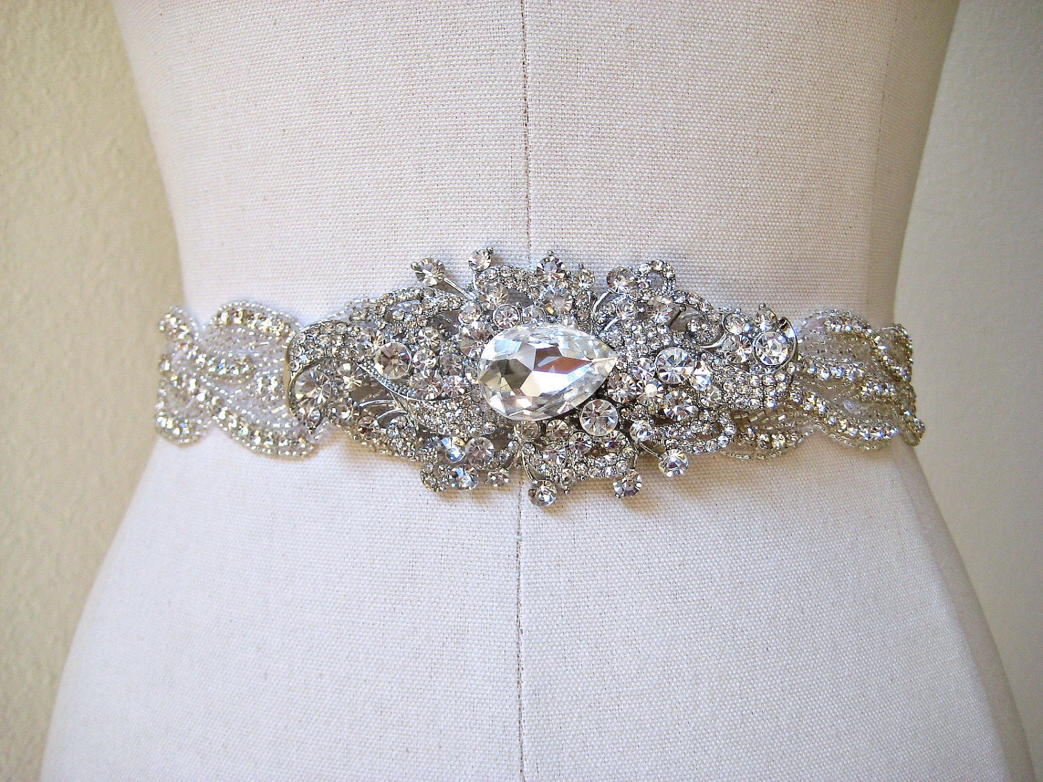 Bridal beaded crystal rhinestone sash/belt with glamorous swarovski jewel piece.  SPLENDOR.