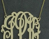 10k gold monogram  ,3 initial. 1.25'' size