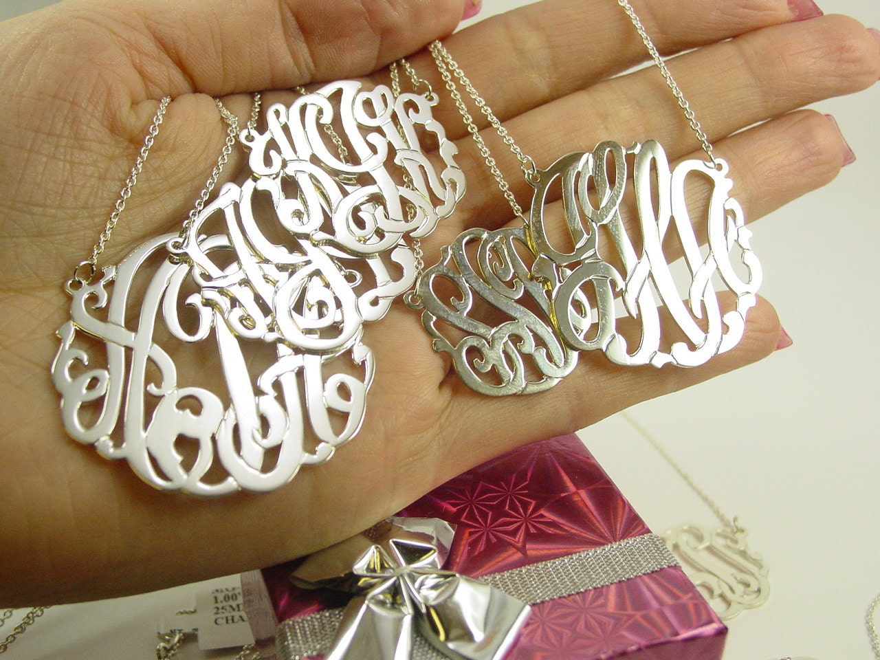 Silver monogram on  1 1/2'' diameter .any 3 letters you provide.