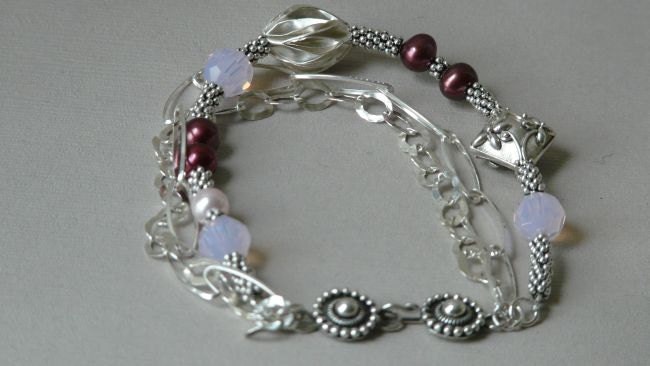 stunning rose water swarovski crystal,cranberry  pearls, Thai sterling silver and Bali sterling silver bracelet