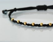 Friendship bracelet with gold plated sterling silver beads