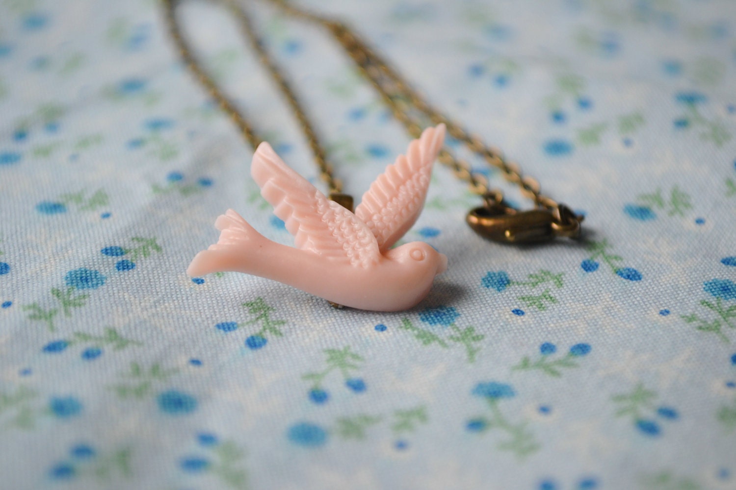 Pale Pink Bird in Flight Resin Cabochon Necklace