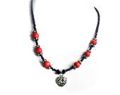 Red beaded necklace coral