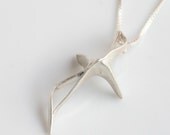 Silver abstract pendant Joyful Dancer