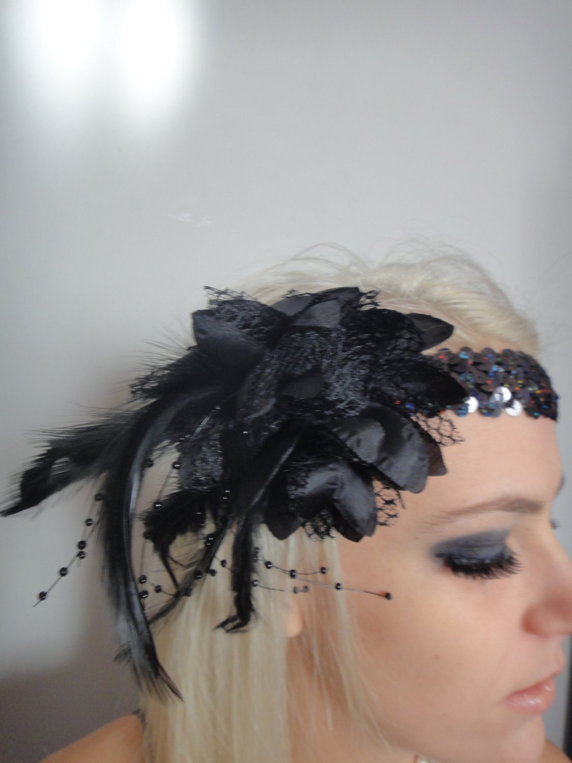 1920s black feather flapper headband races