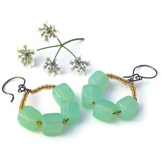 Green glass beaded earrings.  wire hoop earrings. amber orange and green dangle earrings